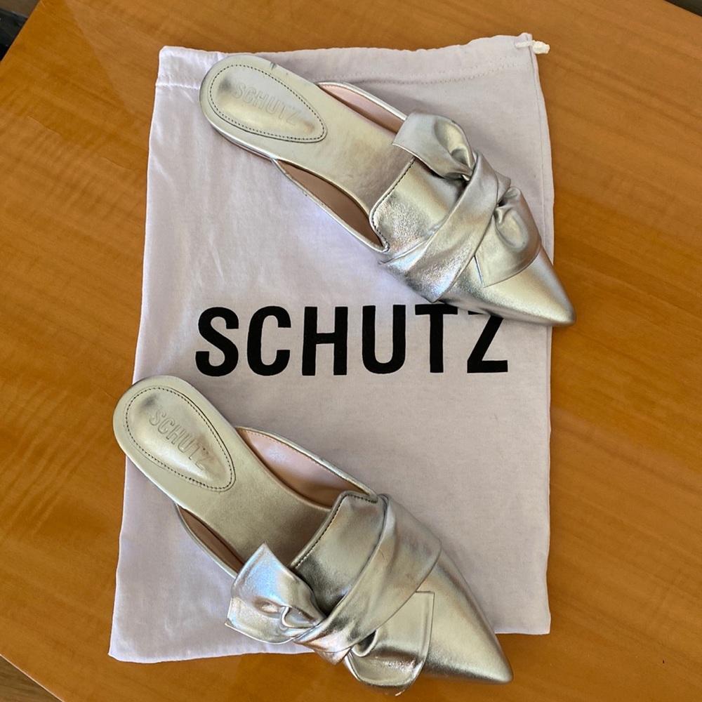 Brand new Schutz flat mules shoes. Size 8